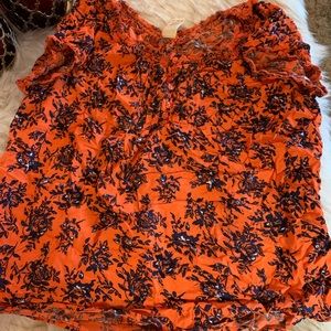 SOLD.  Short sleeve top